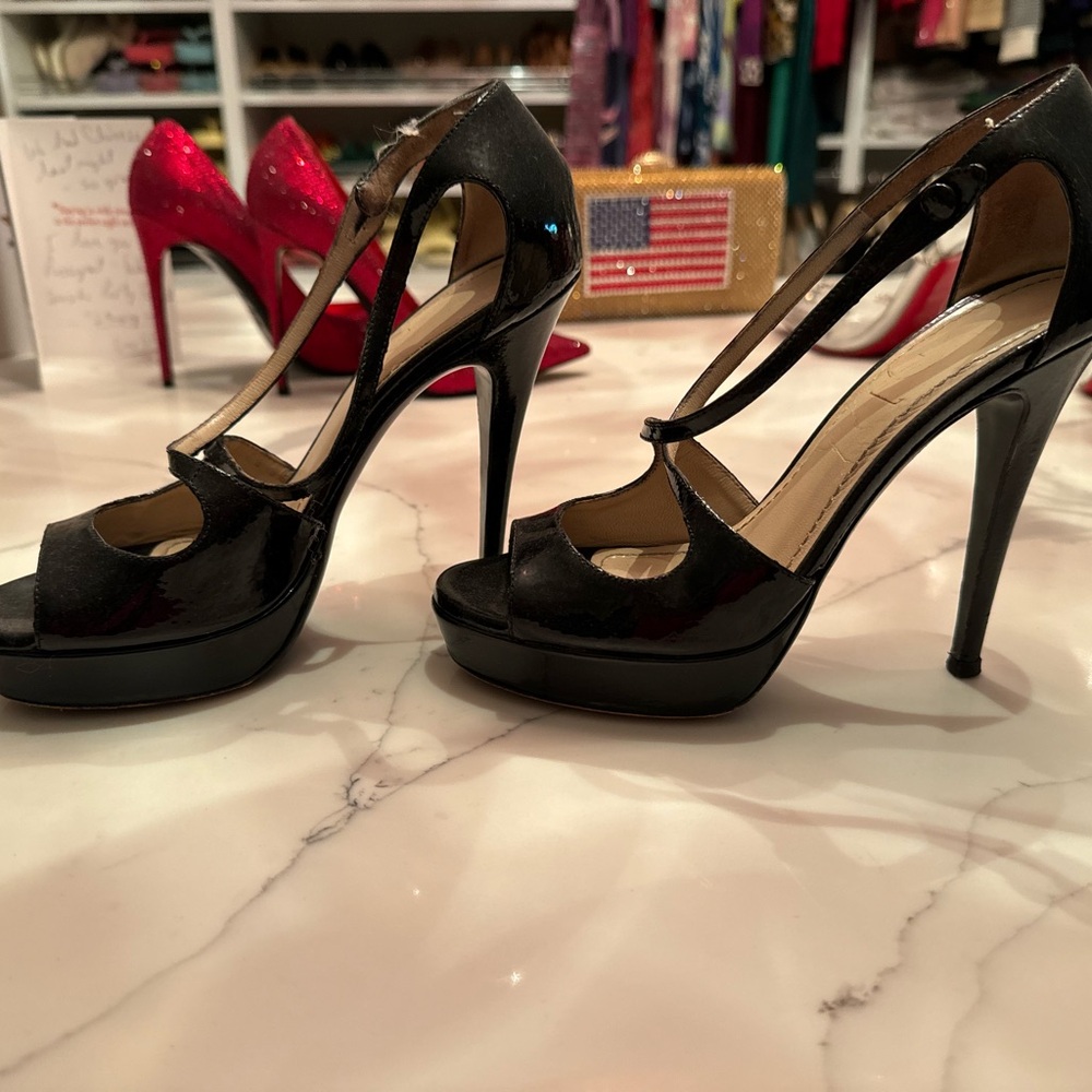 YSL black patent heels 5 inch heels. Very comfortable for the height